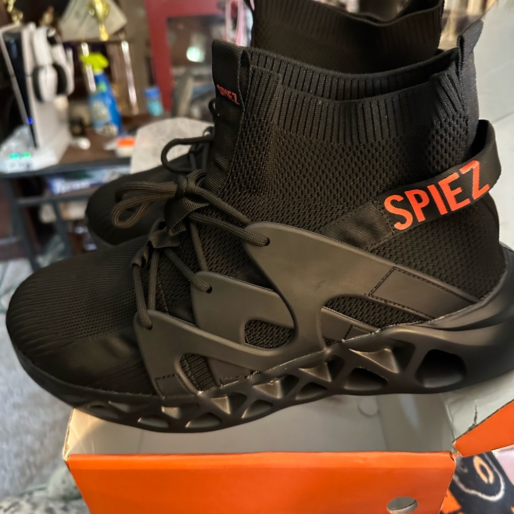 Steel Toe Black Athletic Shoes with Durable Sole and Breathable Design.